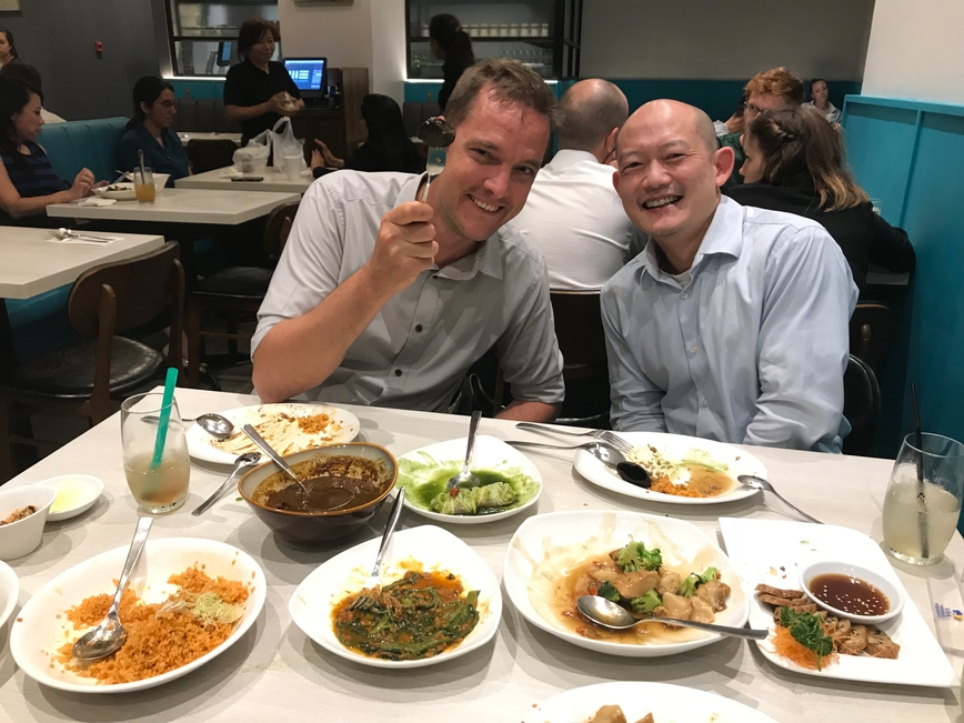 Andreas Wilm and Swaine Chen at a restaurant in Singapore